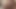 濡れた女の子がシャワーで自分の体を撫でる