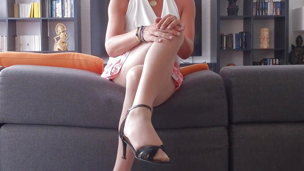 Sexy Crossdresser in Mini Skirt and High Heels