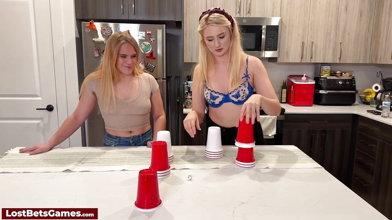 Taylor pairs with Maddie for a playful strip dice cup game