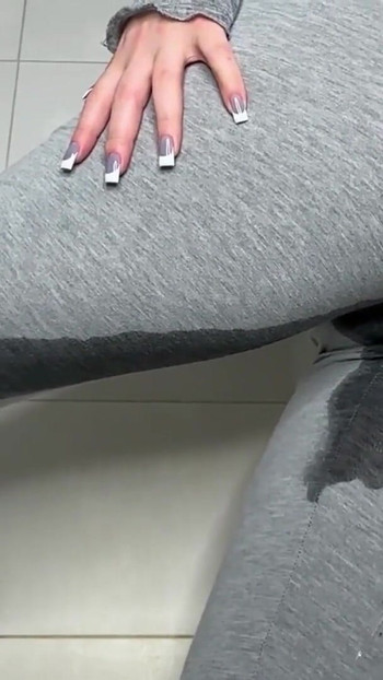 Captivating moment from "close-up squirt leggings in public bathroom!"
