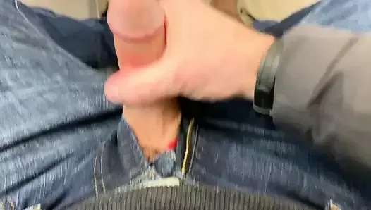 Public jerking off and cumming on a train in jeans.