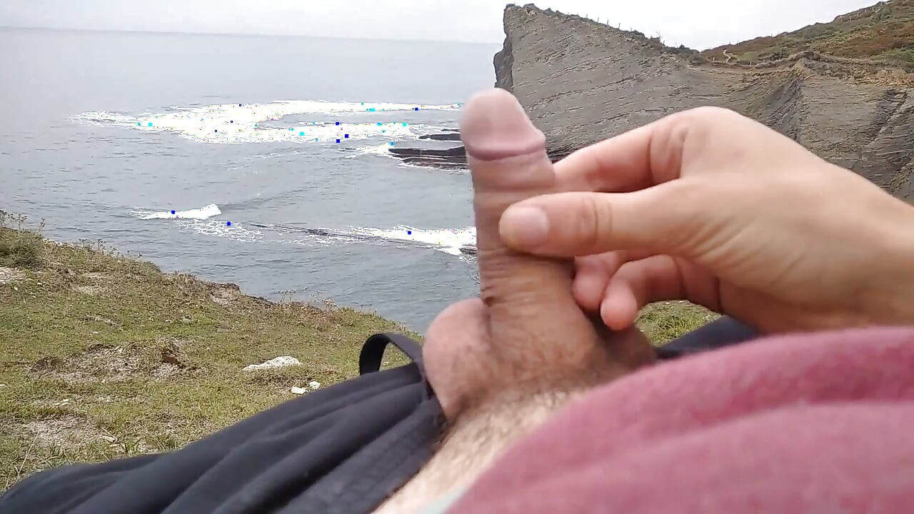 Big Beautiful Big Fat Cock Gets Handjob on the Beach with Gorgeous Sea Views
