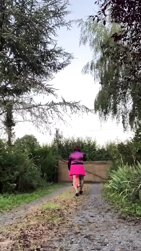 Dressed with a new pink skirt and the fuchsia tie stained with semen for a night out