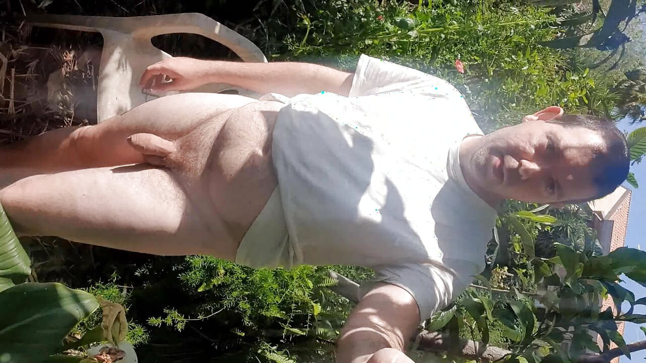 Being completely naked in the garden