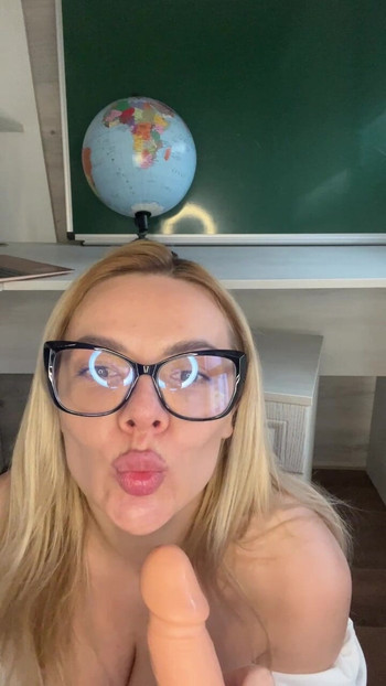 Sexy teacher loves to lick big dildo