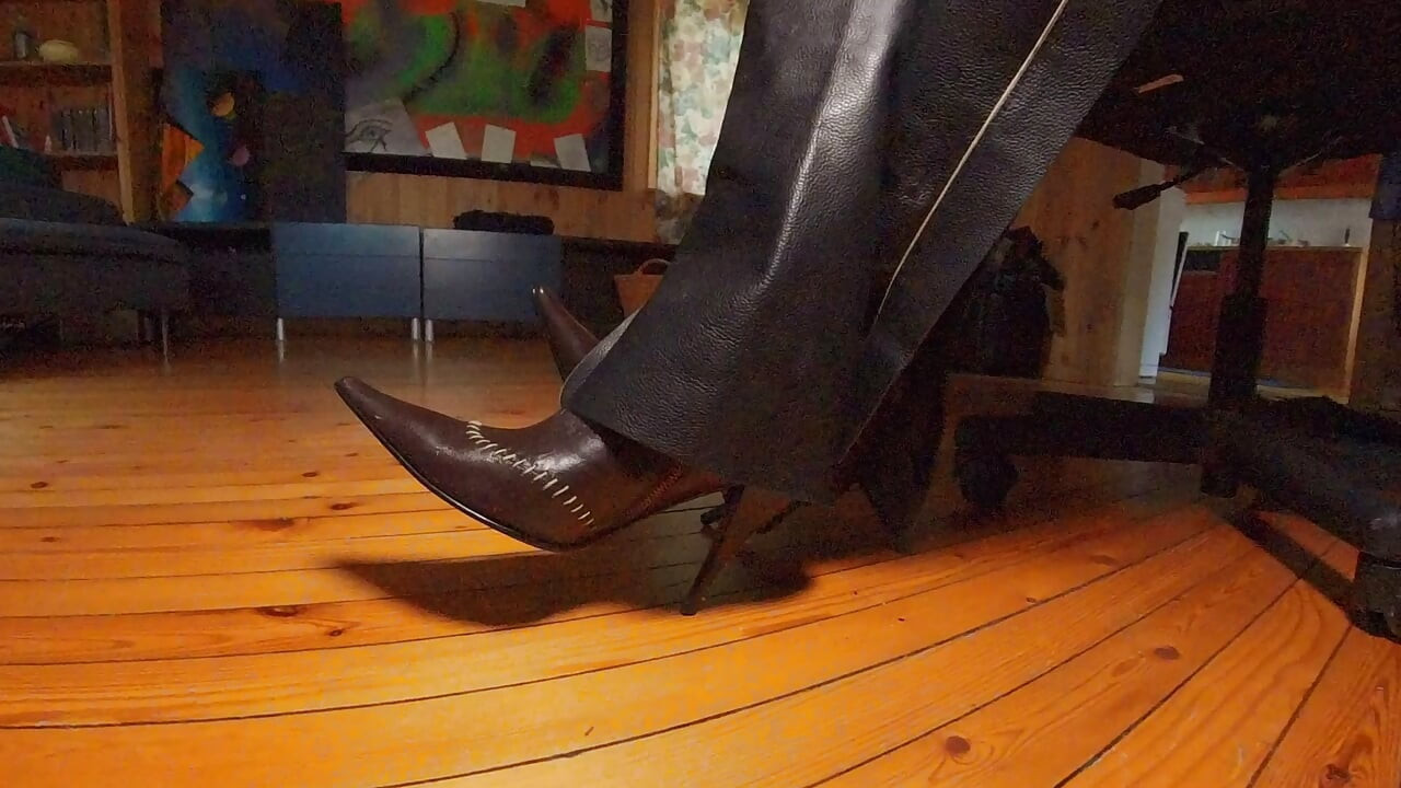 Leather chaps and pointy boots