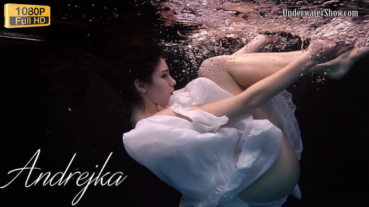 Aqua girl Andrejka underwater stripping and swimming