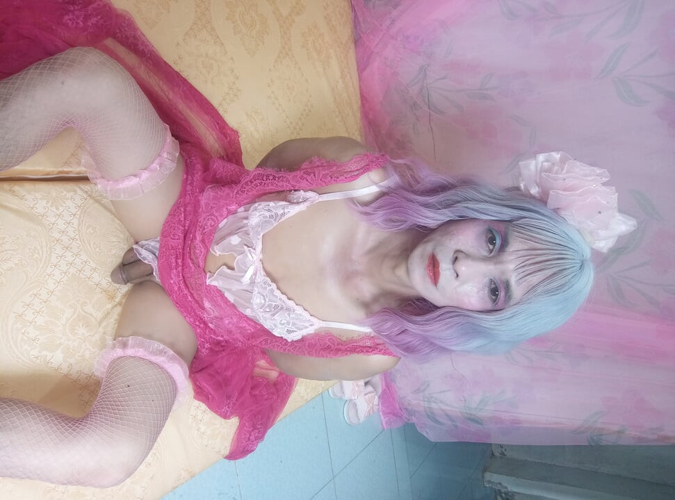 Transgender Oanh Le wears a sexy dress and masturbates.