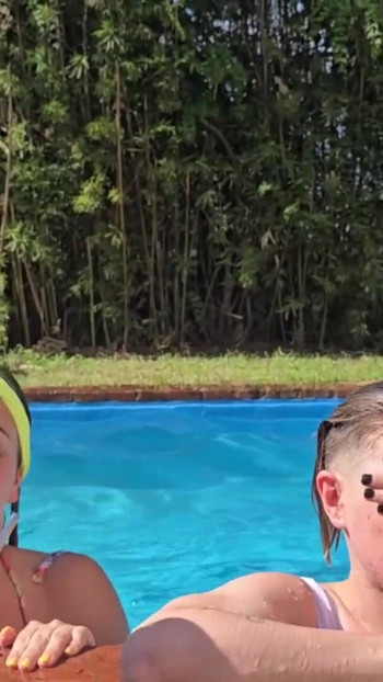 Stunning moment from "Two degenerates fuck in the pool while the neighbors see everything. ARGENTINE LESBIAN"