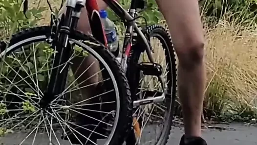 Cyclist jerks off in the park