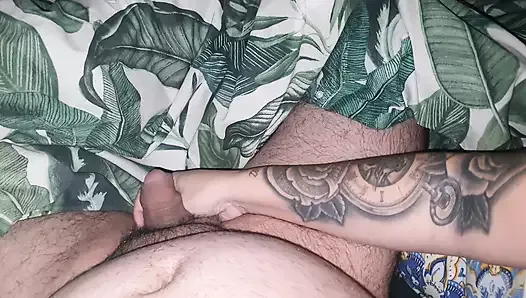 Tattooed step mom plays with step son dick while waching a movie
