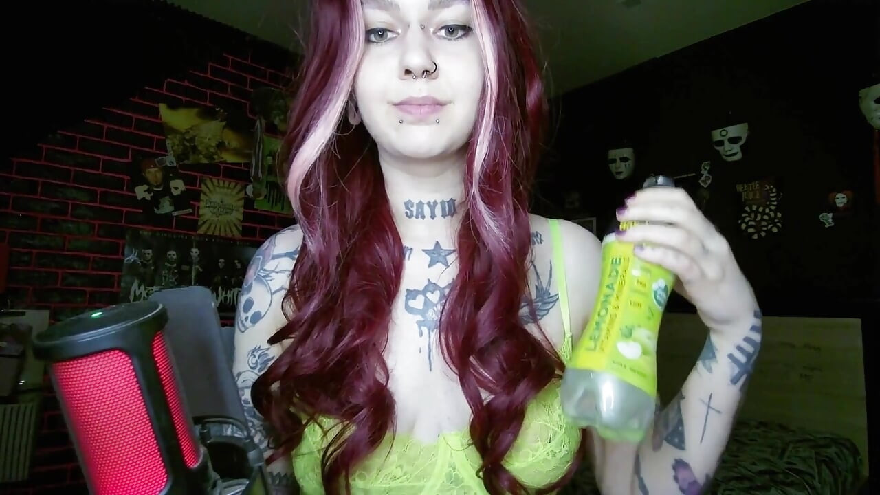 Sexy Alternative Redhead Drinking Soda and Burping