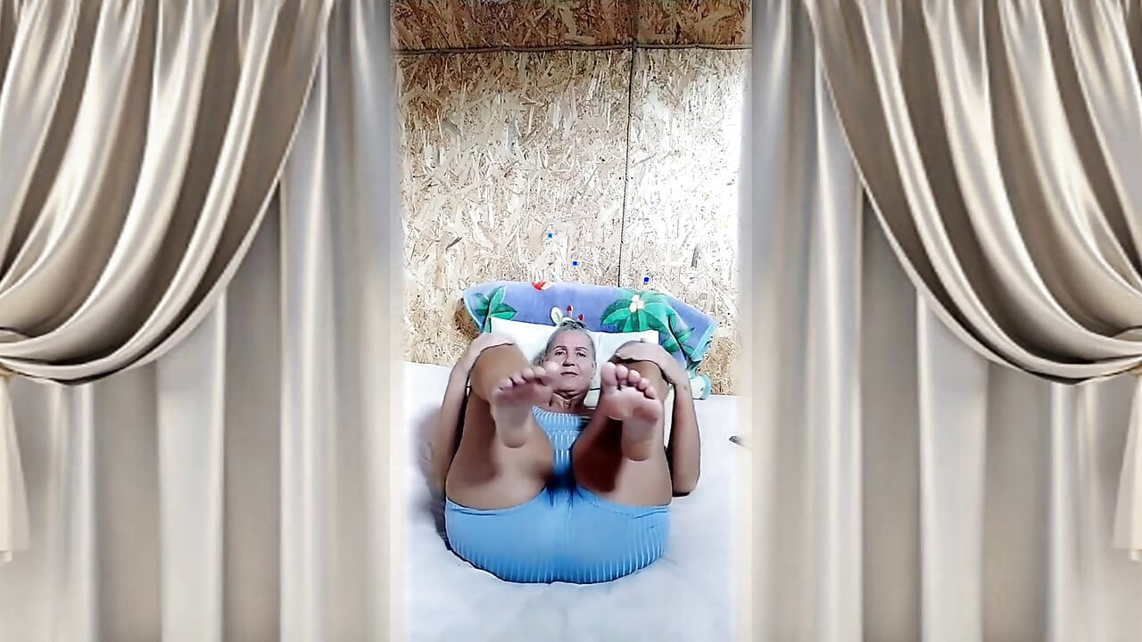 Hot Housewife Lukerya Is Busy Having Fun on a Large Bed.