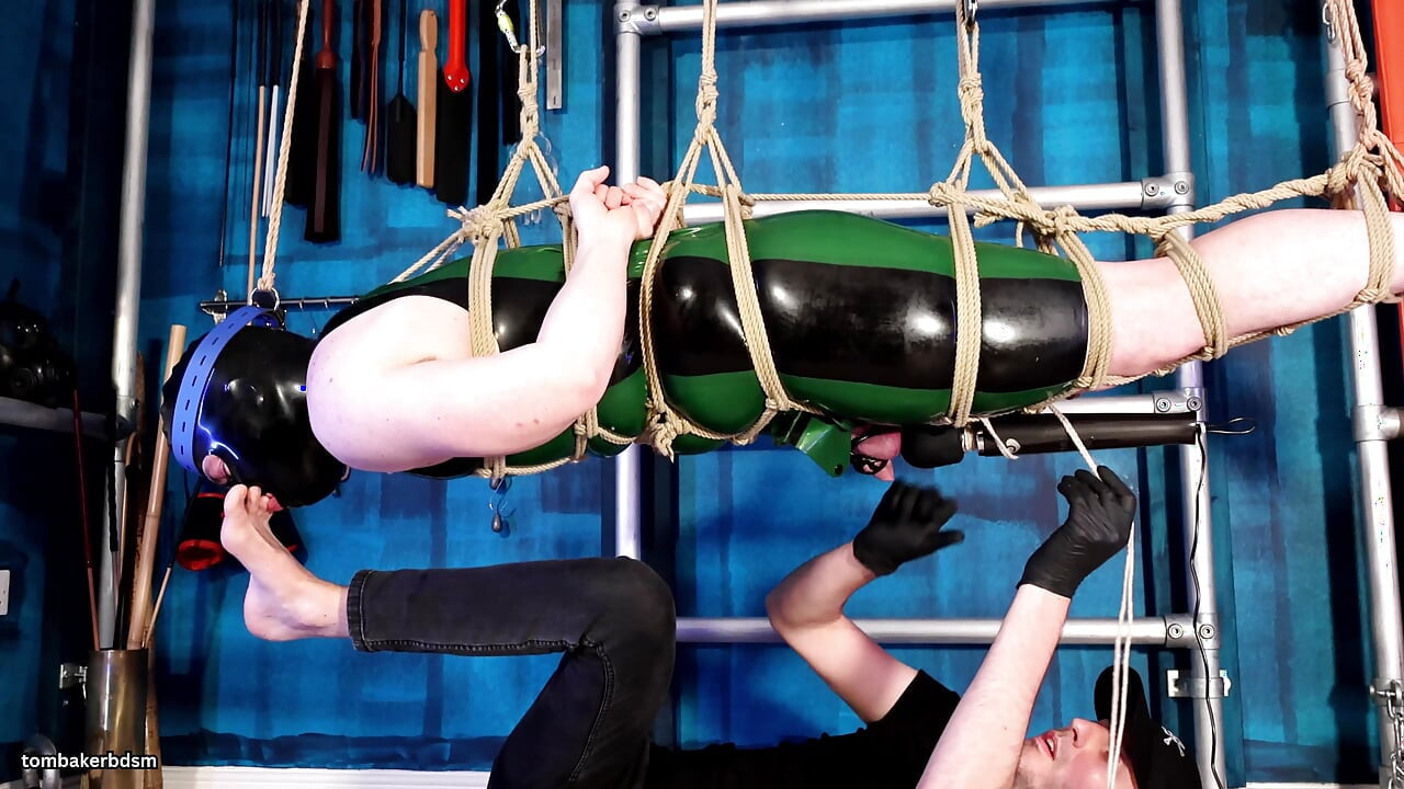 The Chastity Slave Is Bound in Ropes and Tormented with Feet