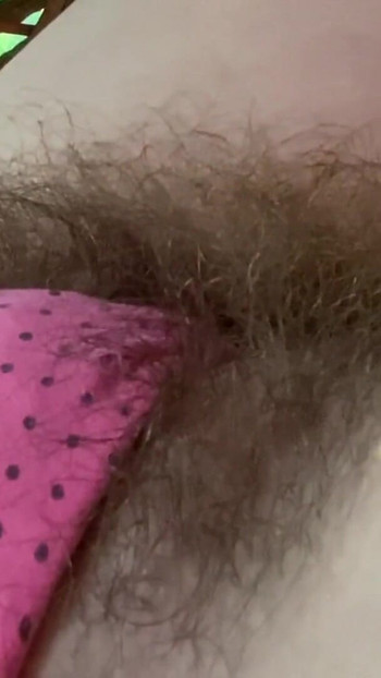 Iconic moment from "Super Hairy Pussy in Panties Closeup Outdoor"