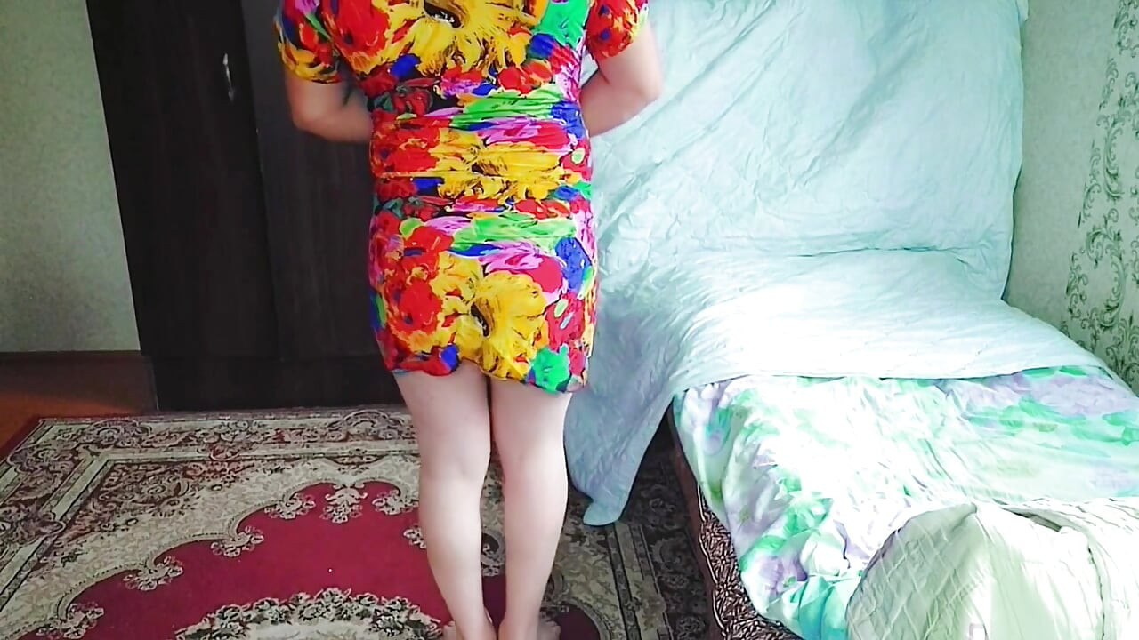 Adorable sissy posing with giant lollipop in bed