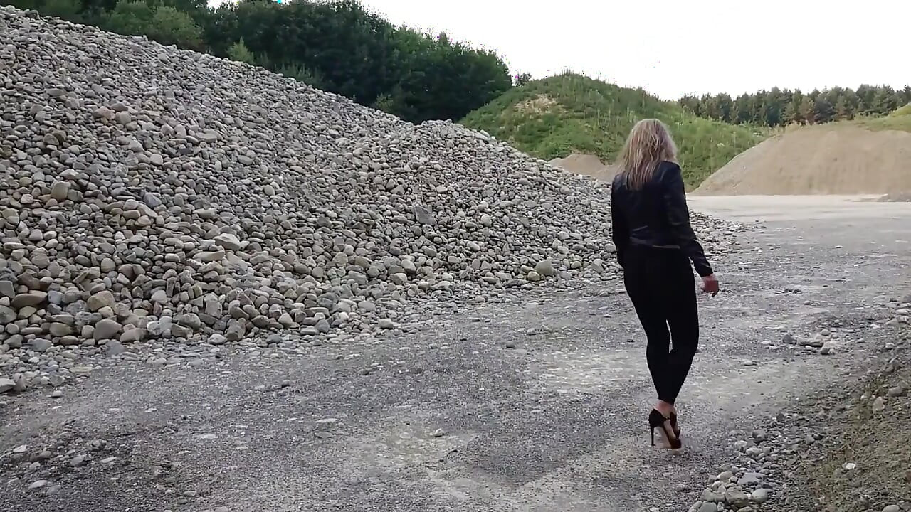 Grandma Is Walking Around a Gravel Pit in Tight Leggings and High Heels!