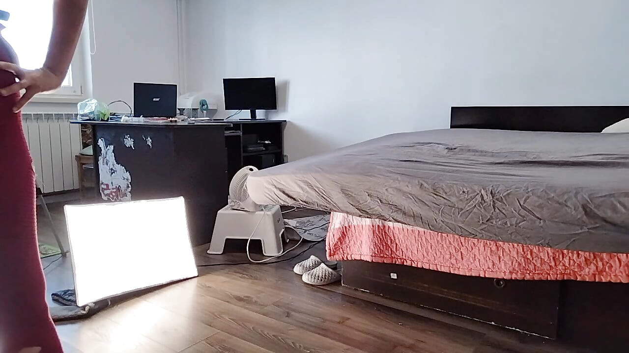 Sexy Latina Having Fun Trying on Clothes and Cutting Them.