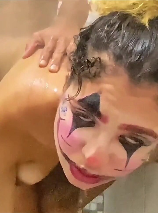 She Balances on the Stick and Comes to Mess up the Clown's Hair in the Bathroom