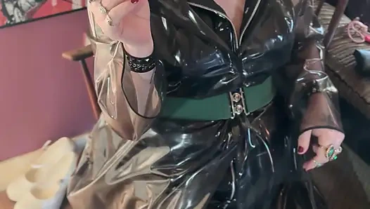 PVC Clad In Her See Through Coat Miss Tina Snua Smokes A Cigarette For You
