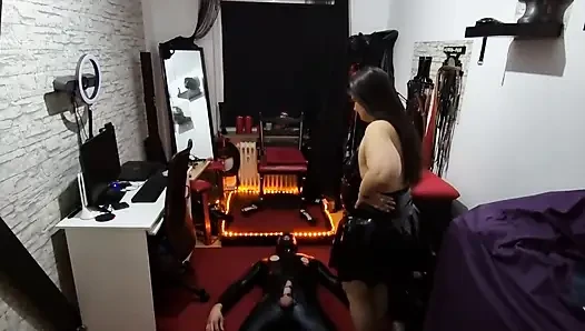 Latex Domme MILF Tramples Slave Dripping in Sweat