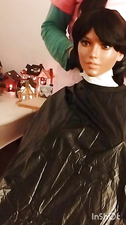 Ebony sex doll Nikki wears barberette capes