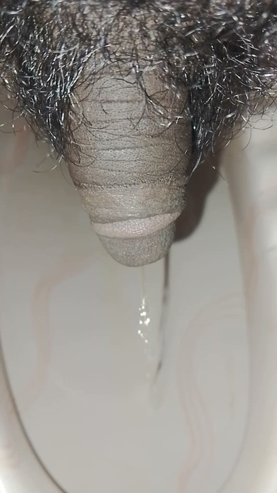 Boy pissing closeup video