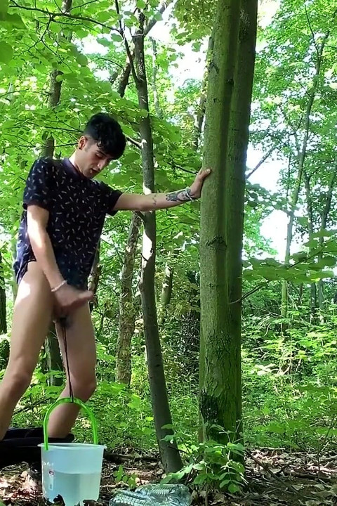 Balls Stretching Outdoor with Bucket Filled with Water and Jerk off