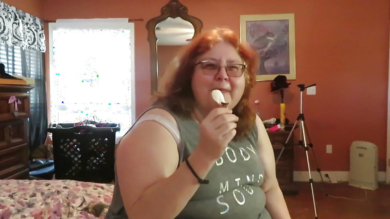 BBW nurse Vicki enjoys eatting a chocolate vanilla ice cream popsiscle