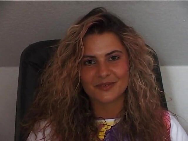 Gorgeous curly haired babe masturbating in solo video