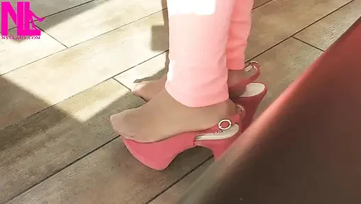 Shoeplay with High Heels in a Bar