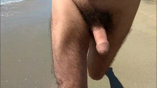 Running nude on the beach
