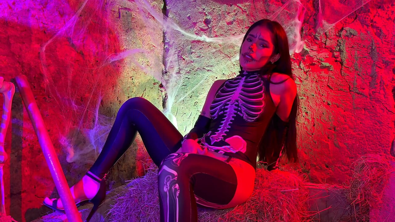 Petite Colombian woman gets aroused upon seeing a skeleton on Halloween night - Carolina Guerrero