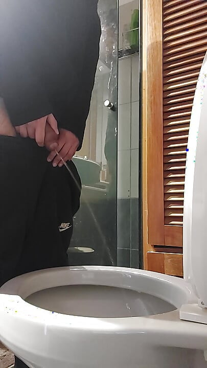 Peeing with a hard cock