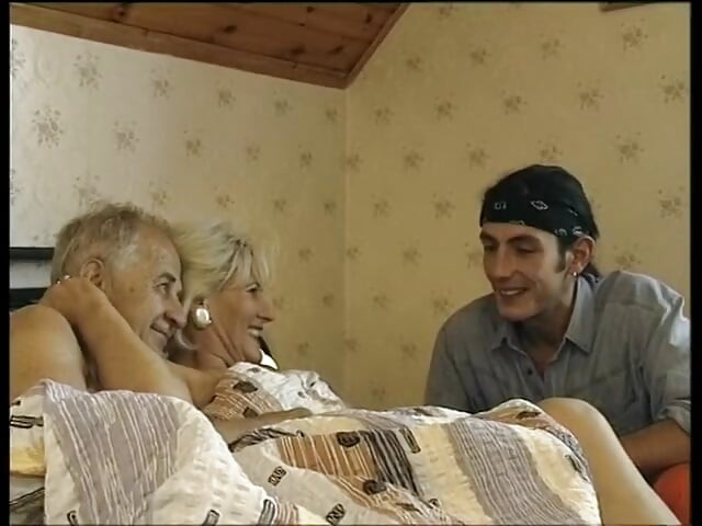 Hairy blonde mature gets spitroasted in a threesome