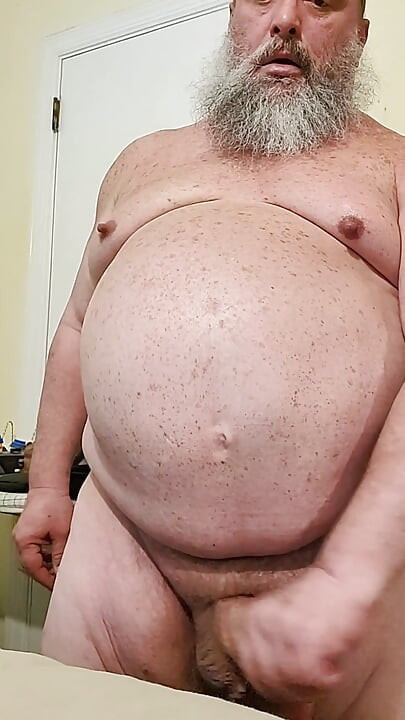 Bear Gene Wade Strokes His Big Cock and Cums