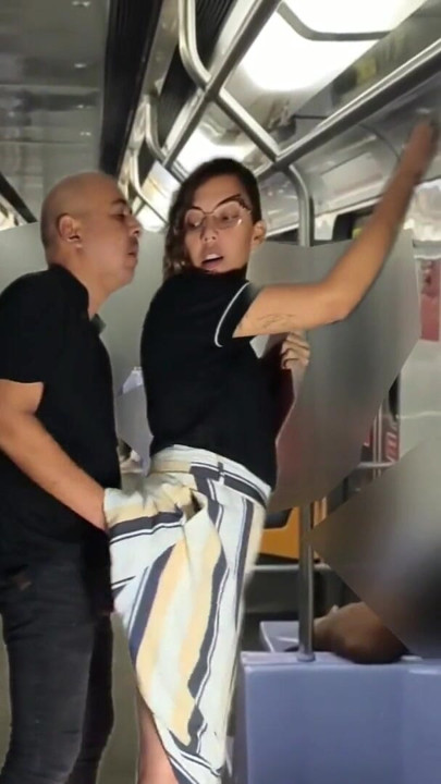 Rubbing himself during the subway ride under her skirt. | Clip 1