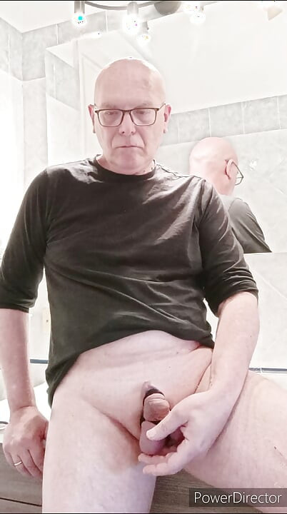 small caged cock and toothbrush