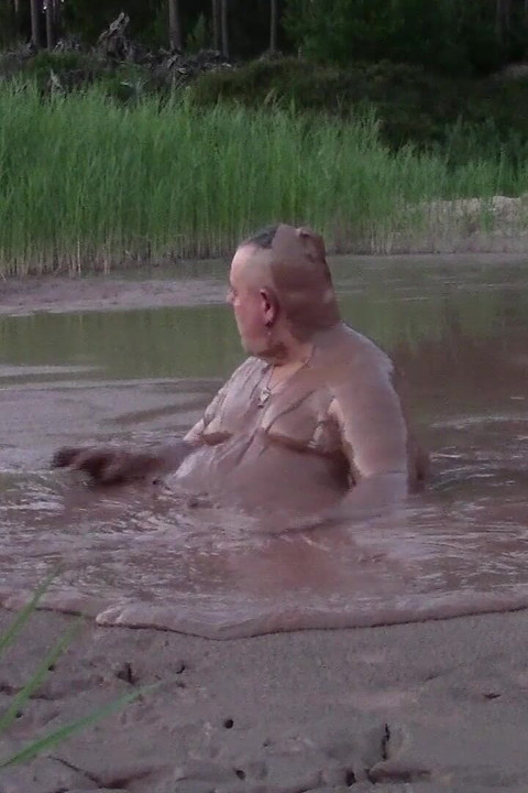 Mud Bath in Deep Quarry Mud Pond