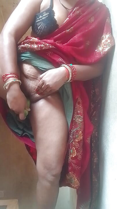Sexy sister-in-law cooling the heat of her with cucumber