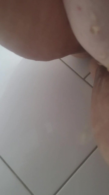 Horny piss in the shower