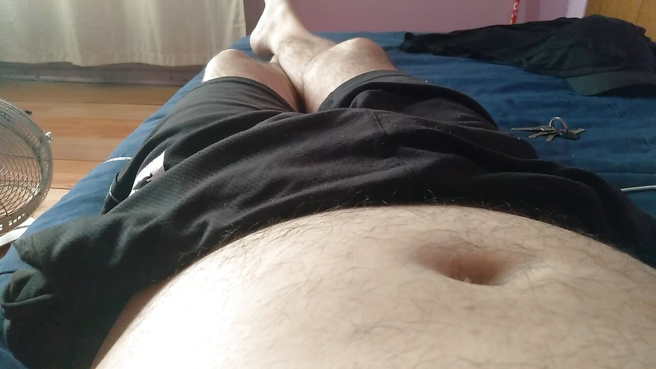 Cute young man has his huge cock oiled with lust