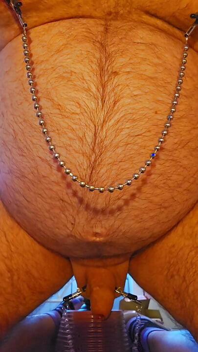 Dildo fucking with nipples clamps