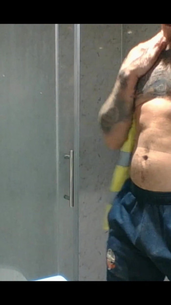 Stunning moment from "Carl working in his filthy hi vis workwear give us a  nice cum shot in the shower"