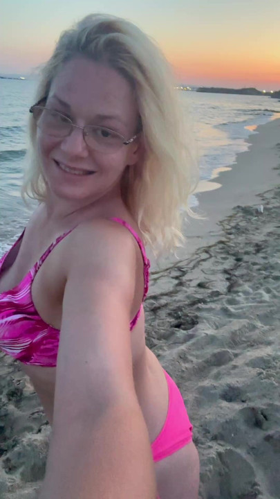 Walking at the beach on the sunset
