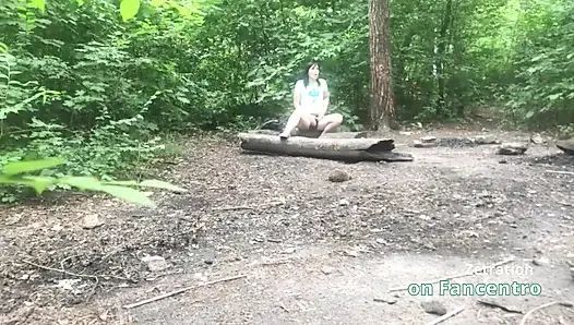 She's pleasuring her pussy  a sweet brunette MILF in the forest, and I'm secretly watching her!