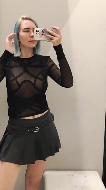 Key moment from "Try on transparent sexy clothes in a mall. Look at me in the fitting room and jerk off to my tits, I like it."