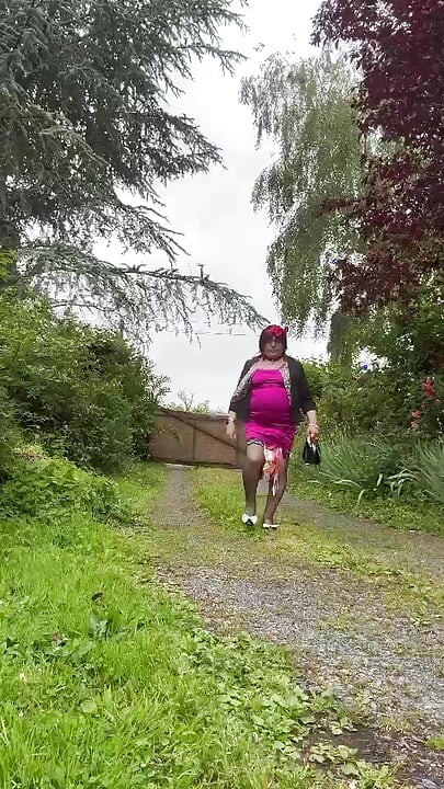 Dressed in a little fuchsia dress for an evening