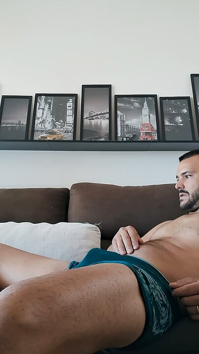 Masturbation on the couch showing her ass