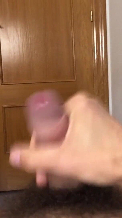 Tall skinny guy stroking his big uncut cock and cumming | Clip 1